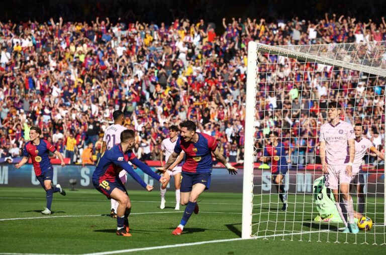 Barcelona break Girona's resolve on the counter opening Real Madrid gap